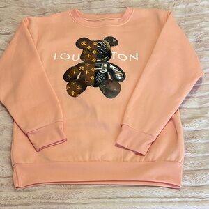 Others Follow Peach Crewneck Sweatshirt with Monogram Teddy Graphic